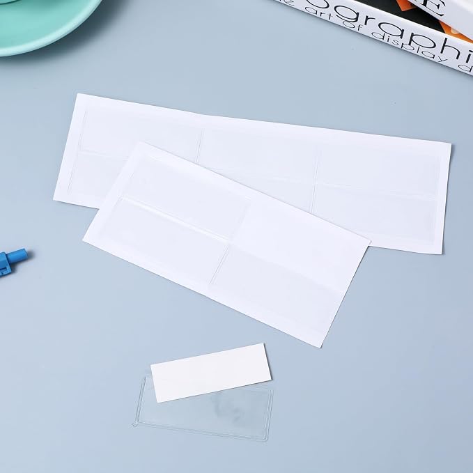 ASTER 30Pcs Self Adhesive Label Holders, Clear Shelf Tag Plastic Drawer Labels Index Card Pockets for Labels with Paper, Self Stick Shelf Label Holder for Supermarket, Bookshelf, Mailbox(3 x 1.3 Inch)