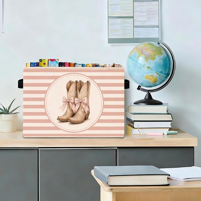 Cowgirl Boots Storage Bin, Pink Foldable Organizer Basket | Cowgirl boots storage bin with pink striped background, bow boot artwork, foldable fabric design and handles.
