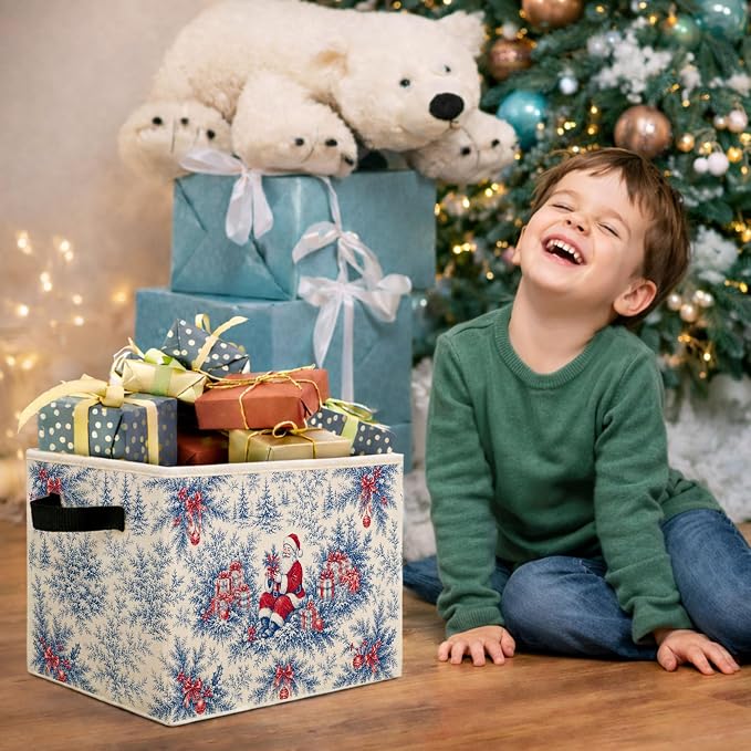 Blue Santa Toile Storage Bin, Christmas Organizer | Blue toile Santa storage bin with gifts, bows, pine branches, and ornaments for holiday toys, books, clothes, and shelves.