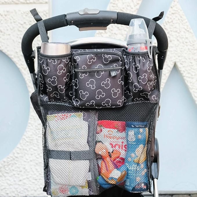 J.L. Childress Disney Baby Cups N Cargo Stroller Organizer & Caddy, Mickey | Essential baby travel accessory with cup holders, large mesh storage pocket & zipper pocket fits UPPAbaby, Doona, Nuna & More